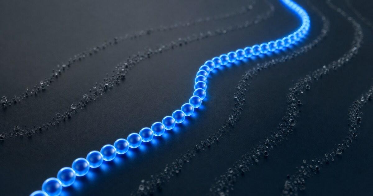 One bright bead path stays illuminated while parallel render trails fade away.